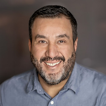 Portrait of Louie C. Gonzales, Associate Broker
